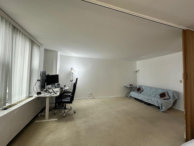 400 E Randolph St Unit 921, Chicago, IL 60601 - office area featuring baseboards and light carpet