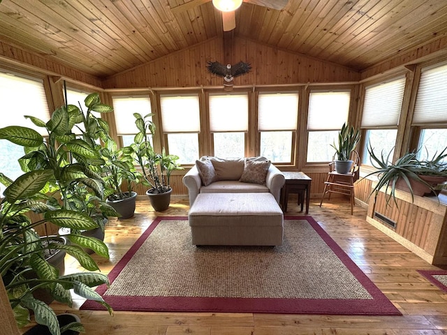 25-14 Country Hill Ct, Lake Carroll, IL 61046 - sunroom featuring vaulted ceiling, hardwood / wood-style flooring, and wooden walls