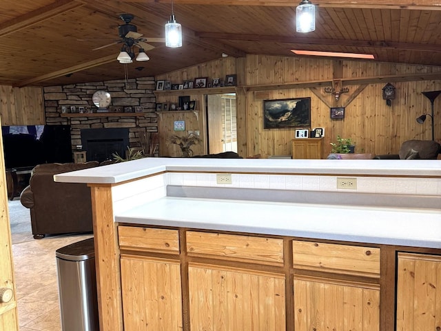 25-14 Country Hill Ct, Lake Carroll, IL 61046 - kitchen featuring wood walls, wooden ceiling, open floor plan, a ceiling fan, and vaulted ceiling with beams