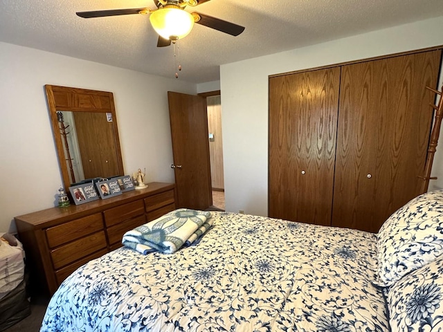 25-14 Country Hill Ct, Lake Carroll, IL 61046 - bedroom featuring a ceiling fan, carpet flooring, a closet, and a textured ceiling