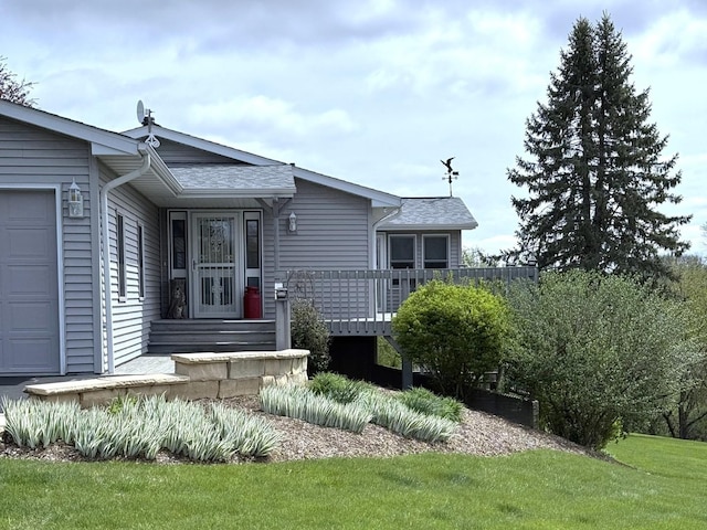 25-14 Country Hill Ct, Lake Carroll, IL 61046 - exterior space with a lawn, roof with shingles, and a garage
