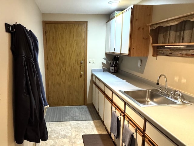 25-14 Country Hill Ct, Lake Carroll, IL 61046 - kitchen with white cabinetry, light countertops, open shelves, and a sink