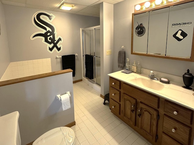 25-14 Country Hill Ct, Lake Carroll, IL 61046 - bathroom with vanity, tile patterned flooring, a shower stall, and a drop ceiling