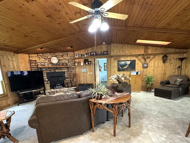 25-14 Country Hill Ct, Lake Carroll, IL 61046 - living room featuring wood walls, lofted ceiling with beams, a fireplace, ceiling fan, and wood ceiling