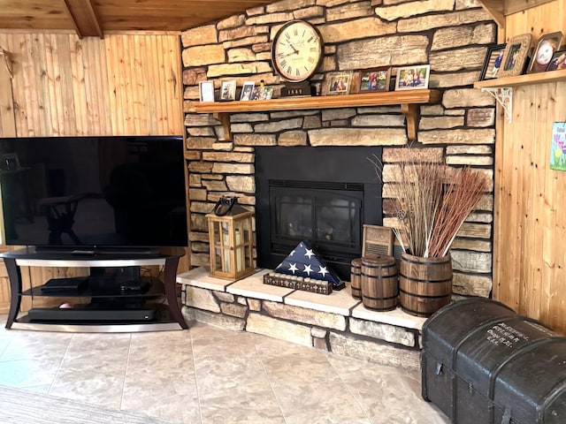 25-14 Country Hill Ct, Lake Carroll, IL 61046 - living area featuring wooden ceiling, wooden walls, and a stone fireplace