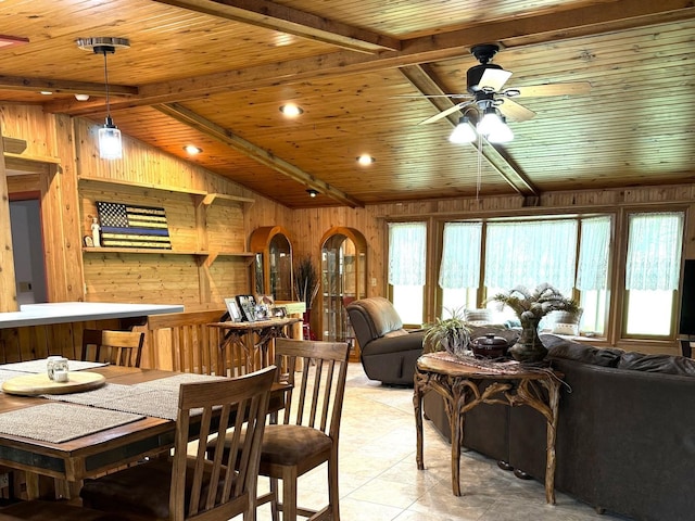 25-14 Country Hill Ct, Lake Carroll, IL 61046 - dining area featuring light tile patterned floors, wood ceiling, a ceiling fan, lofted ceiling with beams, and wood walls