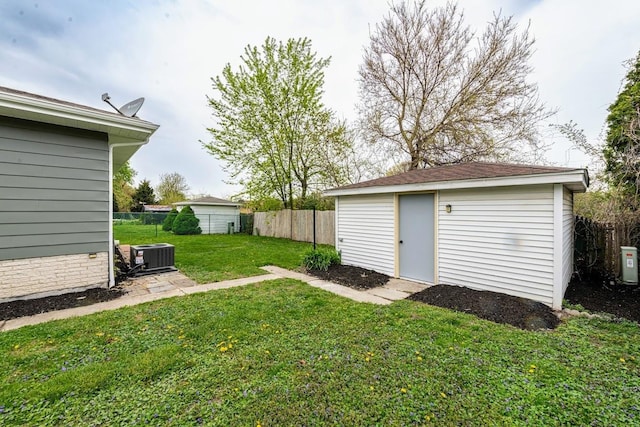 612 Thornwood Dr, South Holland, IL 60473 - view of yard featuring fence, an outdoor structure, and cooling unit