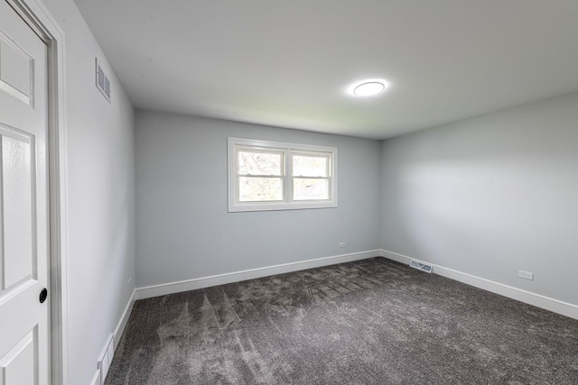 612 Thornwood Dr, South Holland, IL 60473 - unfurnished room featuring visible vents, baseboards, and dark colored carpet