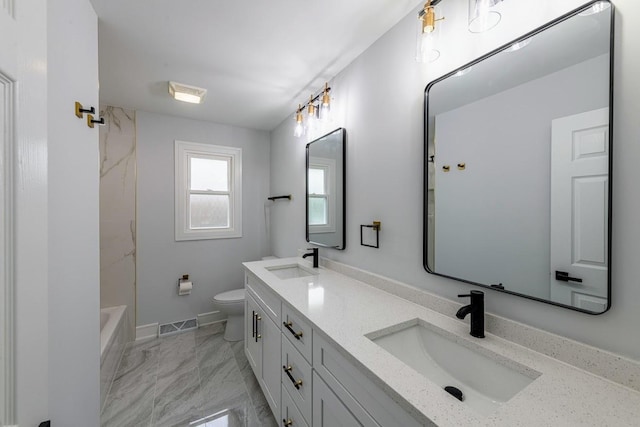 612 Thornwood Dr, South Holland, IL 60473 - full bath featuring a sink, toilet, double vanity, and visible vents