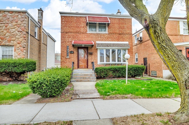 view of front of property with brick siding