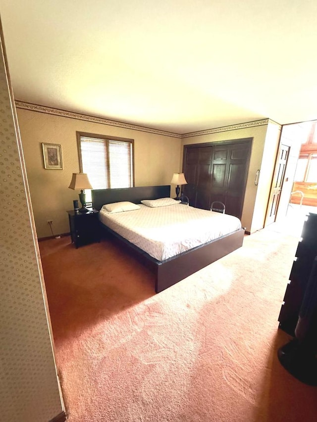 carpeted bedroom with multiple windows and ornamental molding