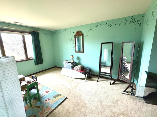 bedroom featuring carpet floors, baseboards, and visible vents