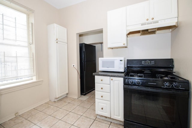 kitchen featuring a healthy amount of sunlight, white cabinets, black appliances, and under cabinet range hood