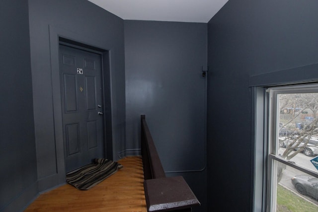 doorway to outside featuring wood finished floors