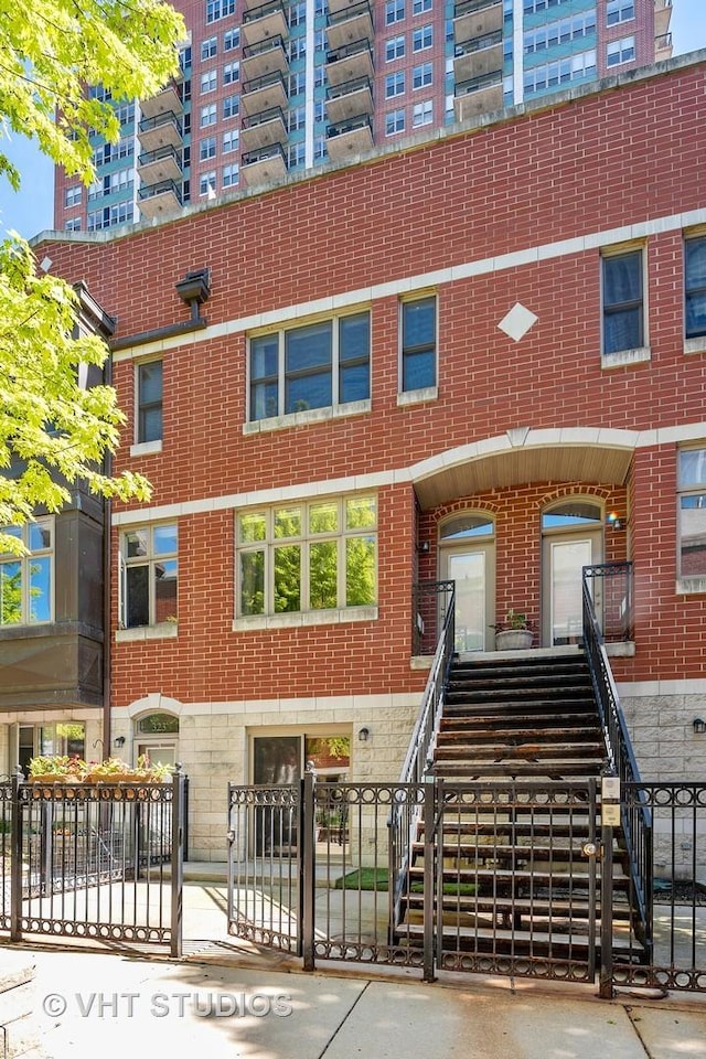 exterior space with fence and stairway