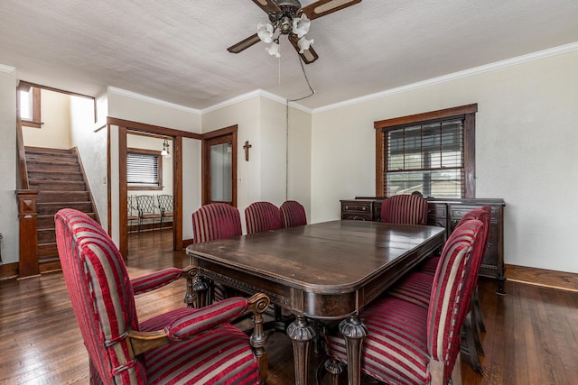 115 Van Buren St, Savanna, IL 61074 - dining area with a ceiling fan, stairway, hardwood / wood-style flooring, plenty of natural light, and crown molding