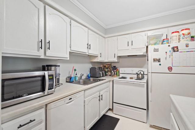 kitchen with under cabinet range hood, ornamental molding, white appliances, a sink, and white cabinets