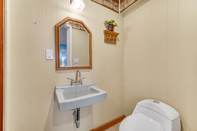 bathroom with a sink and toilet