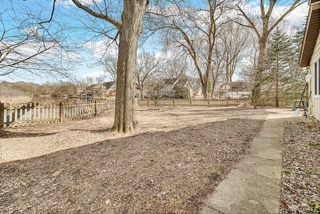 view of yard featuring fence