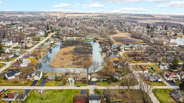 aerial view featuring a water view and a residential view