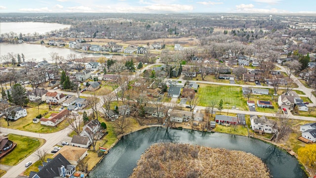 aerial view with a water view and a residential view