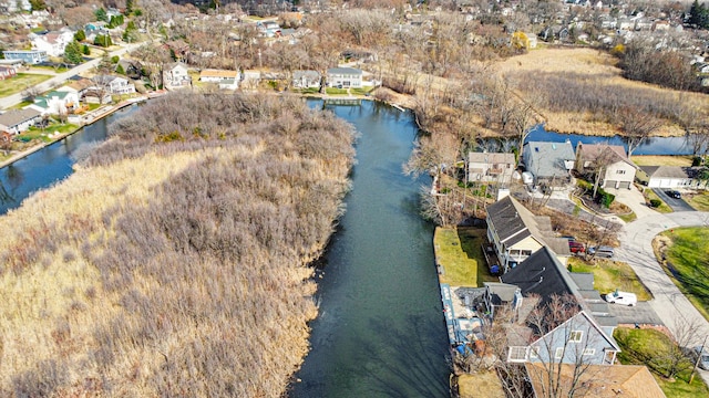 aerial view with a water view and a residential view