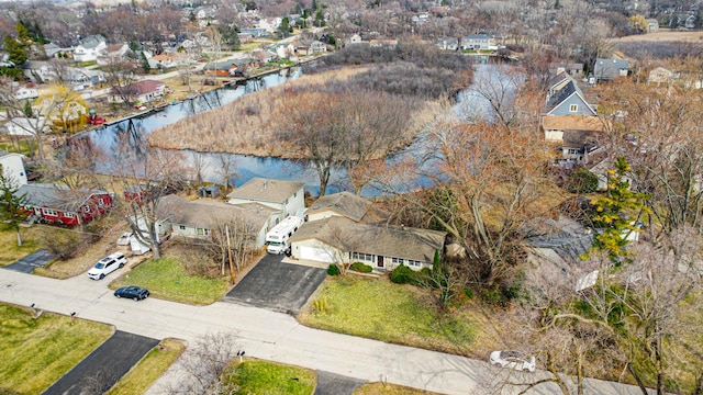 bird's eye view with a water view and a residential view