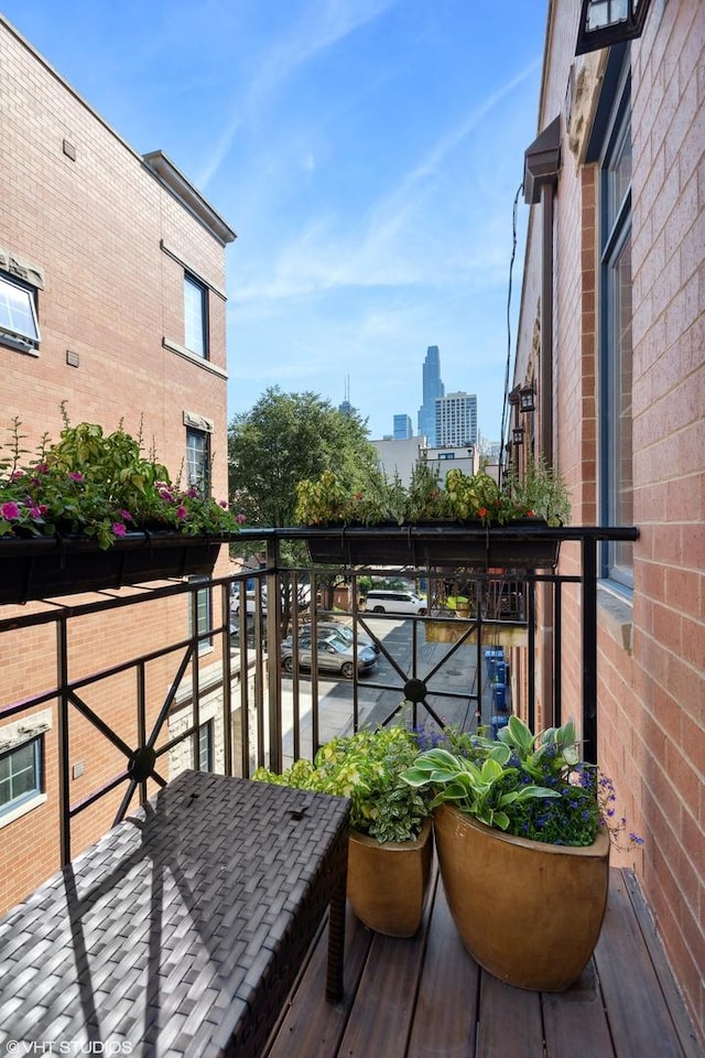 balcony featuring a view of city