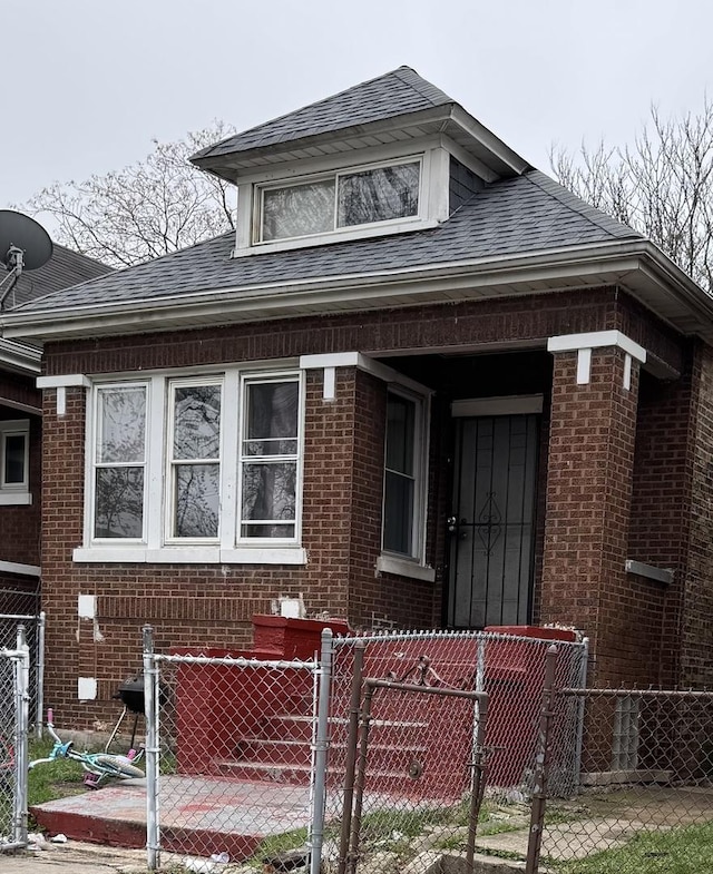 7328 S May St, Chicago, IL 60621 - view of front of house with a gate, fence private yard, and brick siding