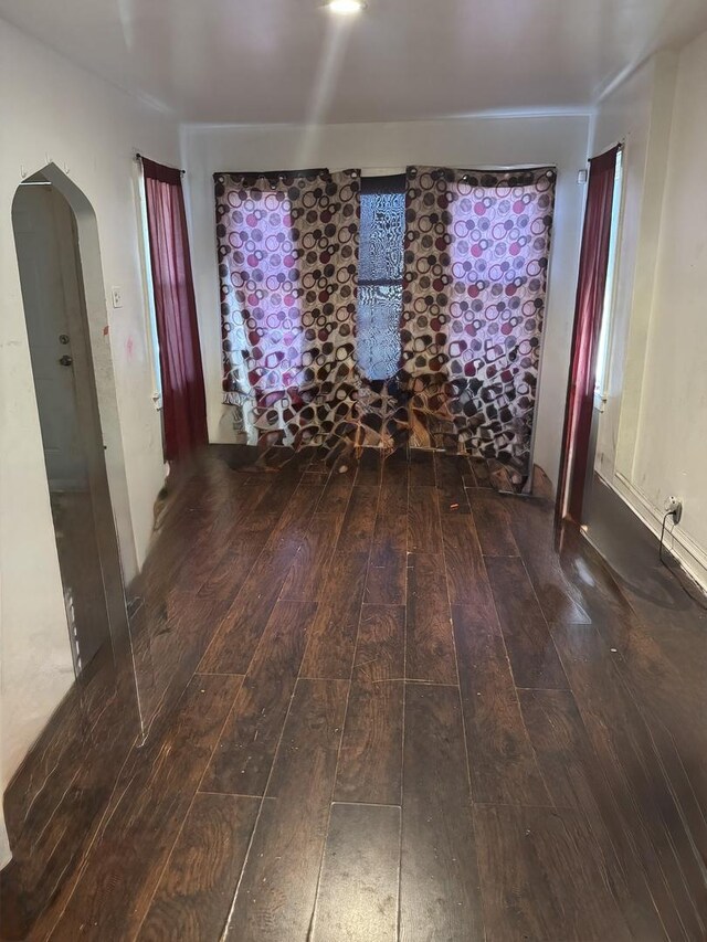 7328 S May St, Chicago, IL 60621 - spare room with arched walkways and hardwood / wood-style flooring
