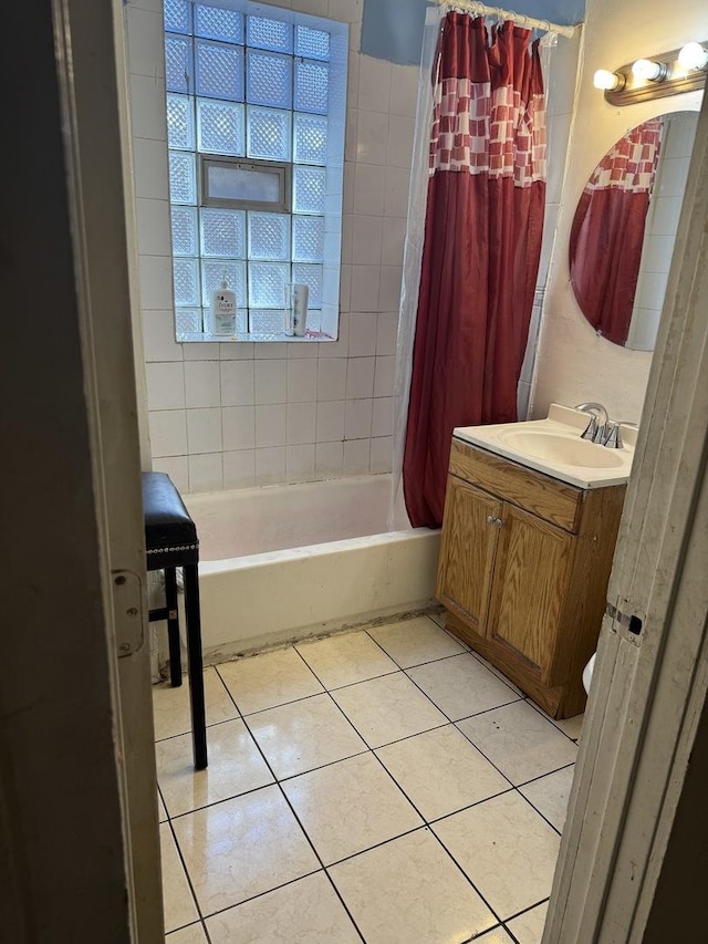 7328 S May St, Chicago, IL 60621 - full bath featuring tile patterned floors, shower / tub combo with curtain, and vanity