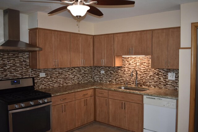 33 N Spring Ave, La Grange, IL 60525 - kitchen featuring white dishwasher, wall chimney exhaust hood, a sink, stainless steel gas range oven, and ceiling fan