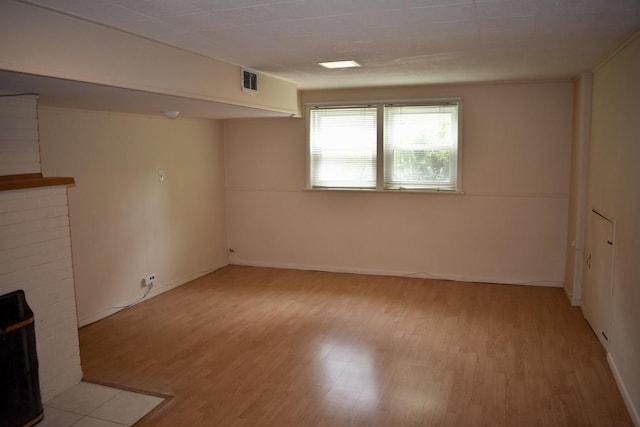33 N Spring Ave, La Grange, IL 60525 - below grade area with light wood finished floors