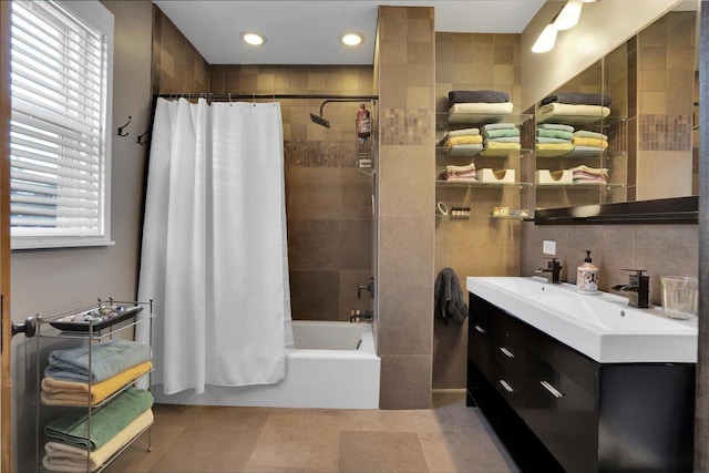 1331 W Granville Ave, Chicago, IL 60660 - full bath featuring tile walls, tile patterned flooring, vanity, and shower / tub combo with curtain