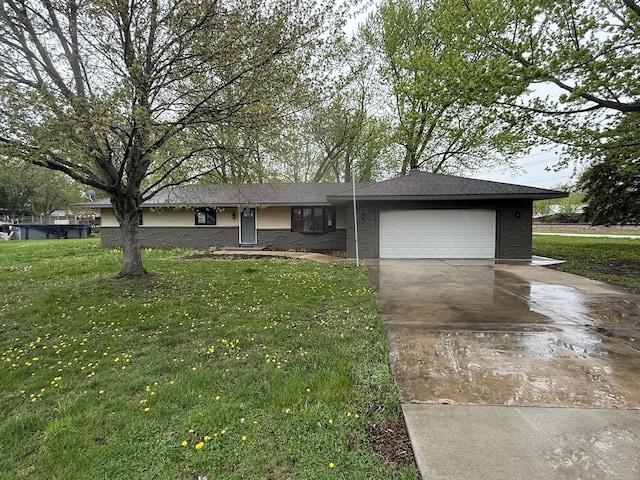 405 9th St, Mazon, IL 60444 - single story home featuring an attached garage, concrete driveway, brick siding, and a front yard