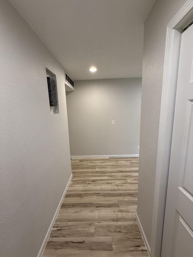 405 9th St, Mazon, IL 60444 - corridor with visible vents, a textured wall, wood finished floors, baseboards, and recessed lighting