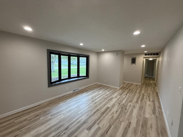 405 9th St, Mazon, IL 60444 - unfurnished room featuring recessed lighting, baseboards, visible vents, and light wood-style floors