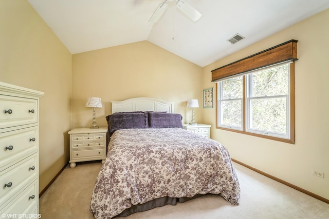 bedroom featuring visible vents, light carpet, baseboards, ceiling fan, and vaulted ceiling