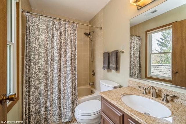 bathroom featuring vanity, visible vents, toilet, and shower / bath combination with curtain