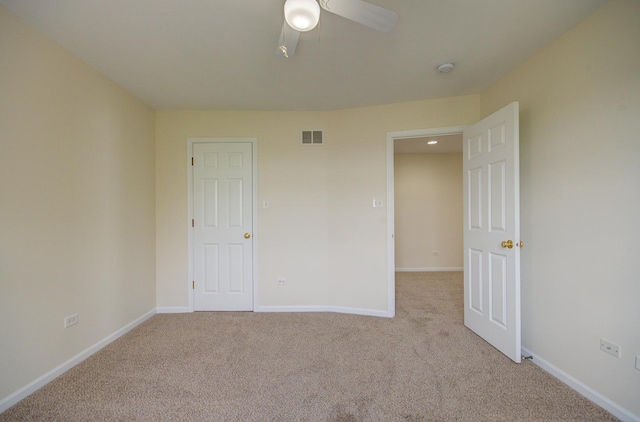1120 Redwood Ln, Minooka, IL 60447 - unfurnished room featuring carpet floors, ceiling fan, visible vents, and baseboards
