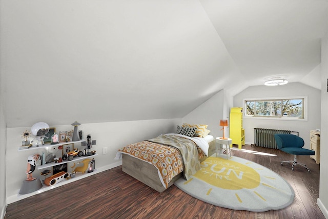 2910 N 76th Ct, Elmwood Park, IL 60707 - bedroom featuring radiator, wood finished floors, and lofted ceiling