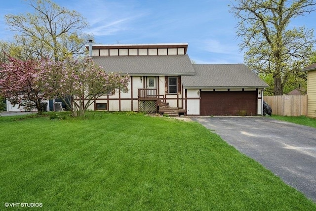 27833 W Bayview Dr, Ingleside, IL 60041 - view of front of house with a front lawn, a shingled roof, driveway, and fence