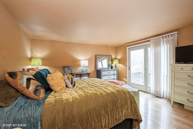 27833 W Bayview Dr, Ingleside, IL 60041 - bedroom with wood finished floors and access to exterior