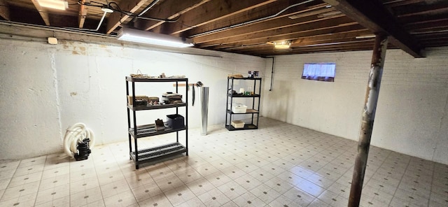 unfinished basement with tile patterned floors