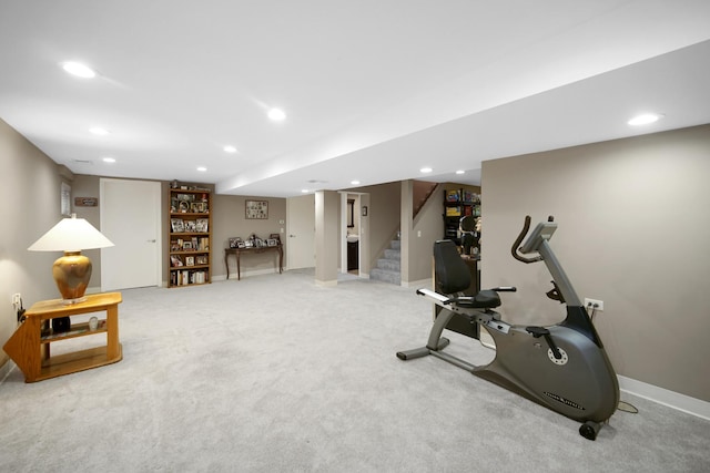 exercise room featuring baseboards, carpet flooring, and recessed lighting