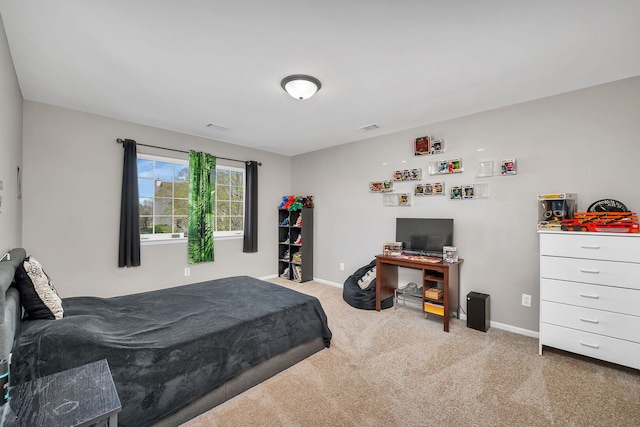 bedroom featuring baseboards, carpet flooring, and visible vents