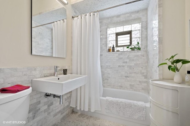 2311 N Commonwealth Ave Unit 3E, Chicago, IL 60614 - full bathroom with toilet, tile walls, a wainscoted wall, and shower / tub combo with curtain