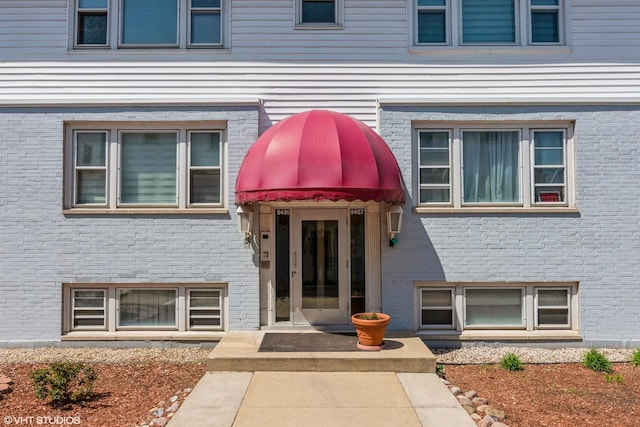 9459 Kelvin Ln Unit 2665, Schiller Park, IL 60176 - view of exterior entry with brick siding