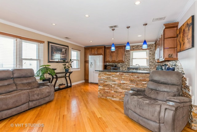 9459 Kelvin Ln Unit 2665, Schiller Park, IL 60176 - living room featuring baseboards, light wood finished floors, and visible vents