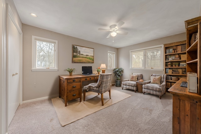 carpeted office space with baseboards, ceiling fan, and recessed lighting